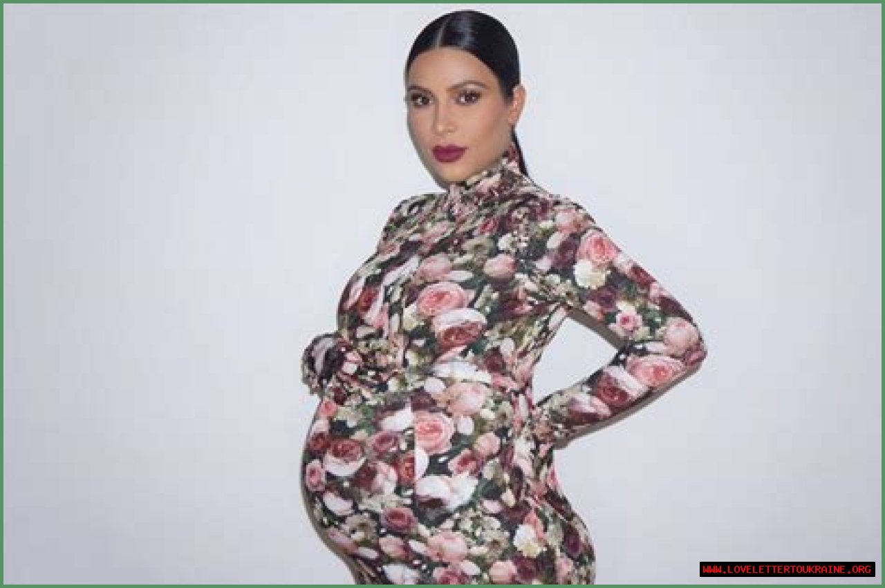 Kim Kardashian Dresses as Her Pregnant Met Gala Self for Halloween